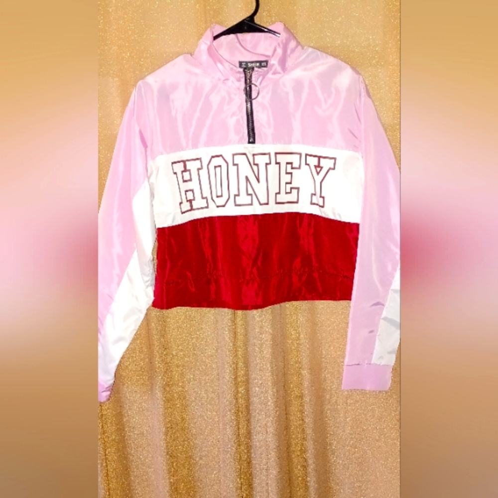 A nice lightweight throw over jacket is made out of windbreaker material ,nice